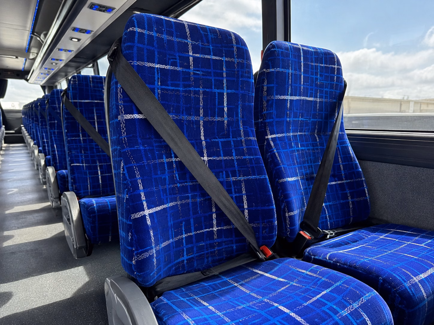 plymouth easy corporate transportation with a plymouth charter bus